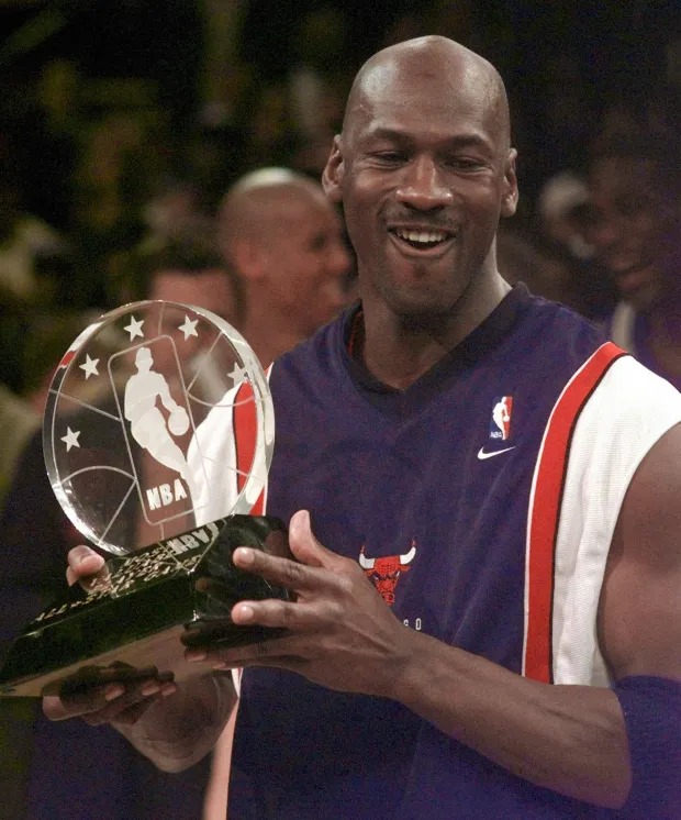 CONGRATULATION:  Michael Jordan  welcome Smith for NBA award celebration after retirement