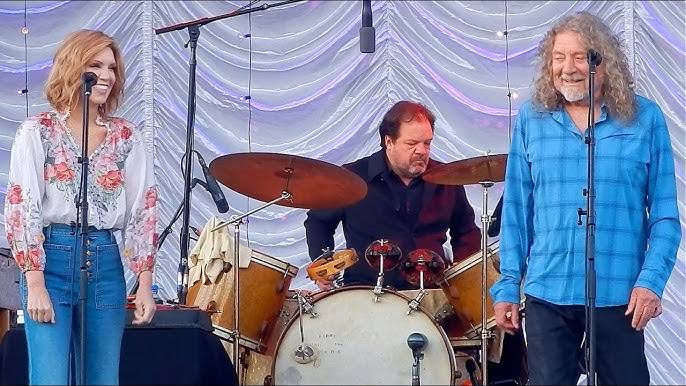At 76, rock legend Robert Plant was brought to tears during a rare acoustic set at Glastonbury, overwhelmed by a roaring crowd chanting his name. Known for his untouchable presence with Led Zeppelin, Plant showed raw vulnerability as he covered “When The Levee Breaks” with Alison Krauss—his hands covering his face as emotion overtook him. In that powerful moment, the rock god became simply Robert: humbled, human, and deeply moved by the love of his fans